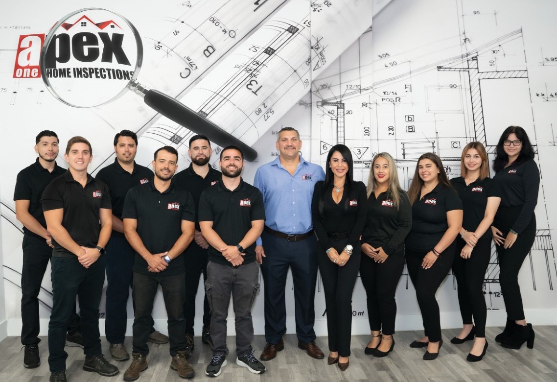 Group photo of the Home Design and Remodeling Show team at the event venue.
