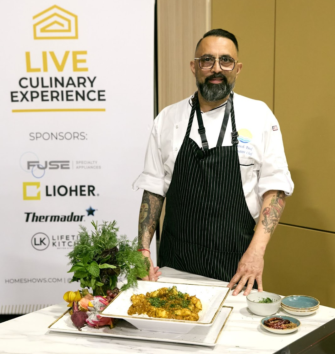 Chef presenting plated dishes at the Live Culinary Experience sponsored by LiOher.